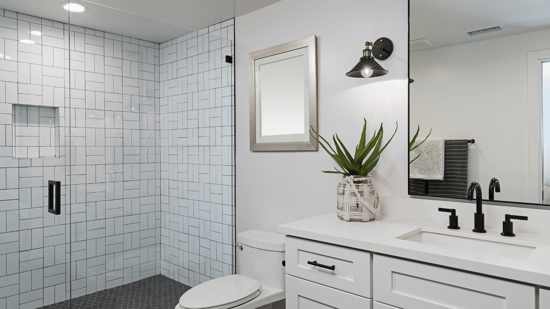 Bathroom renovation with vanity and tiled shower